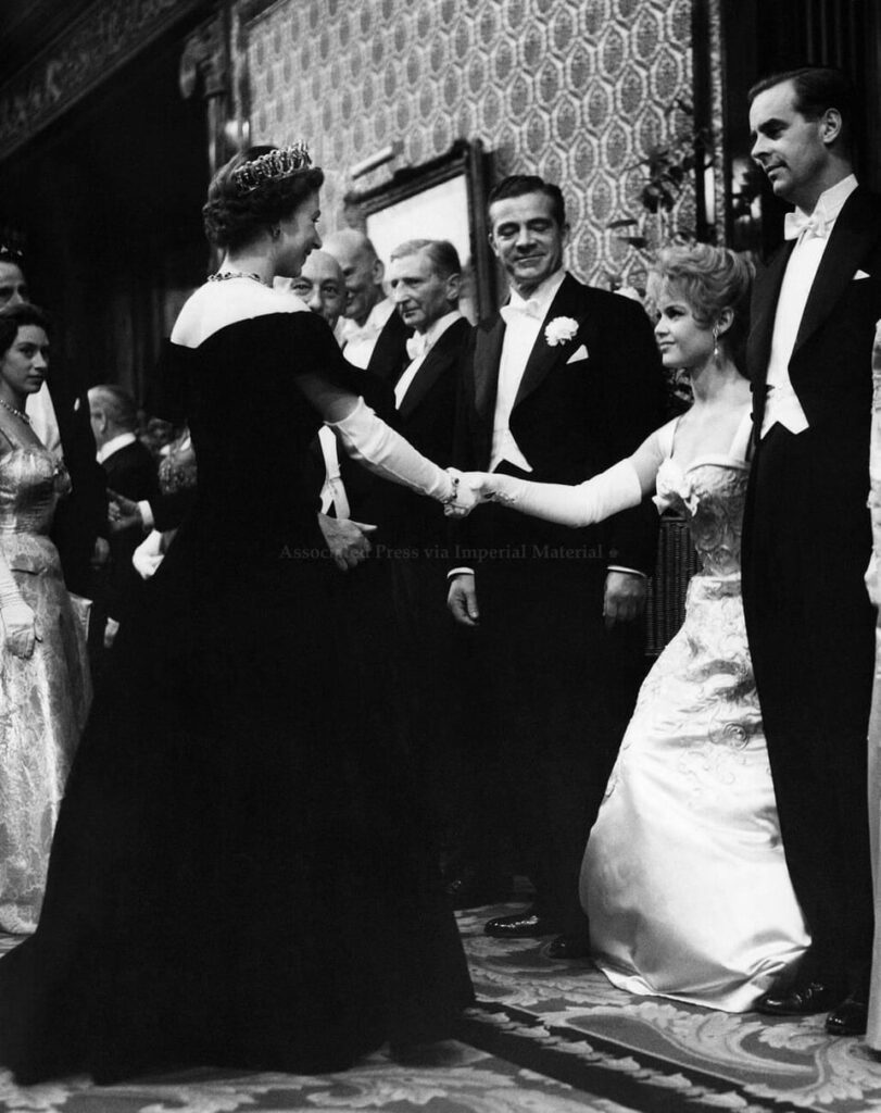 The late Queen Elizabeth meeting the late Brigitte Bardot