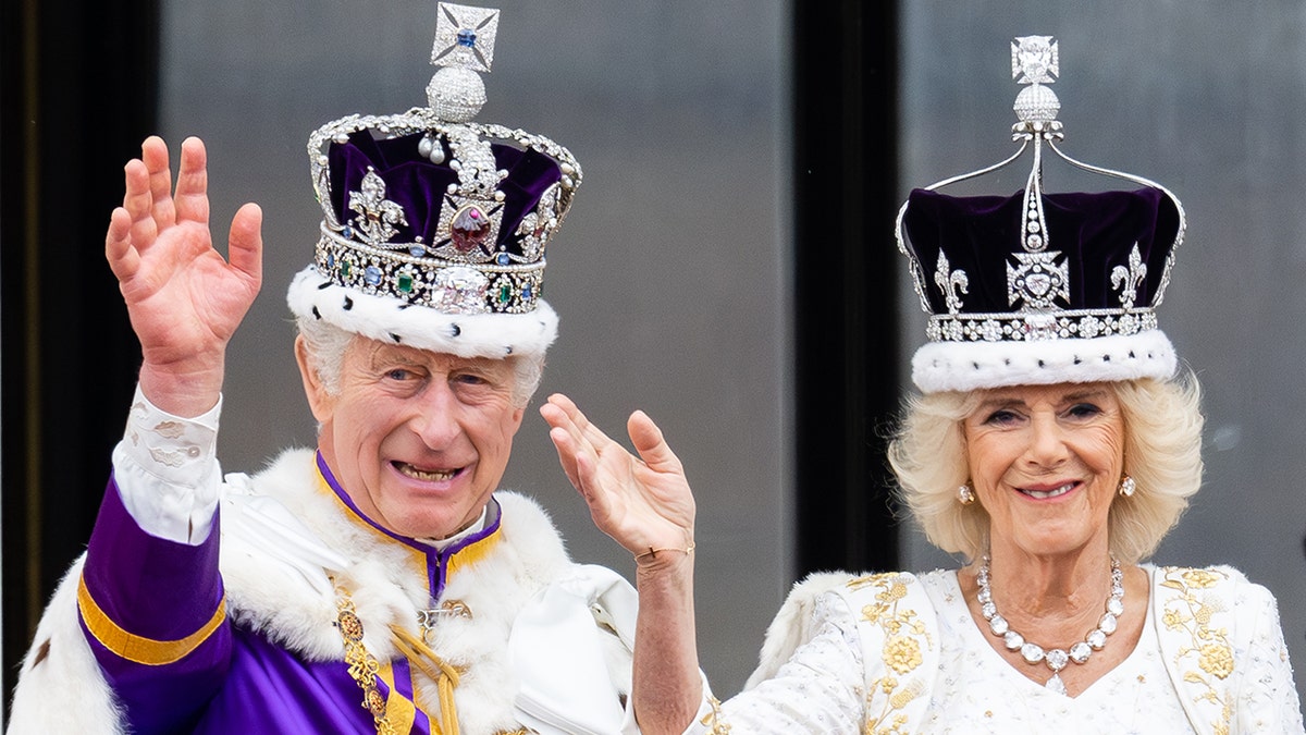 Charles and Camilla waving to the crowd after being crowned the King and Queen of England in 2023.