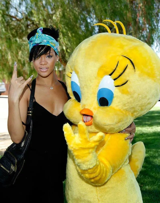 my new favorite genre of pics, celebrities posing with random animated characters