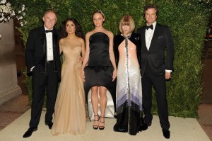 (L-R) Francois-Henri Pinault, Salma Hayek, Stella McCartney, Anna Wintour and Colin Firth attend the Metropolitan Museum of Art's 2011 Costume Institute Gala featuring the opening of the exhibit Alexander McQueen : Savage Beauty. Hayek wears vintage Alexander McQueen couture, McCartney wears her own design and Wintour wears Chanel. (Photo by Steve Eichner/WWD/Penske Media via Getty Images)