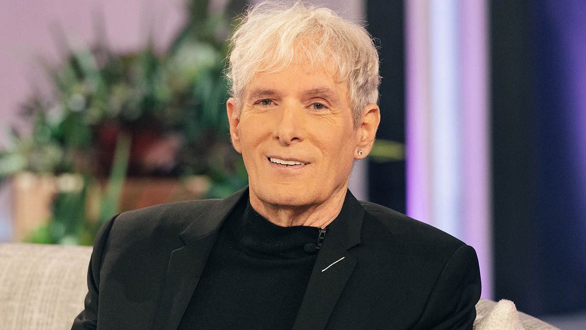 Michael Bolton smiling in 2023 