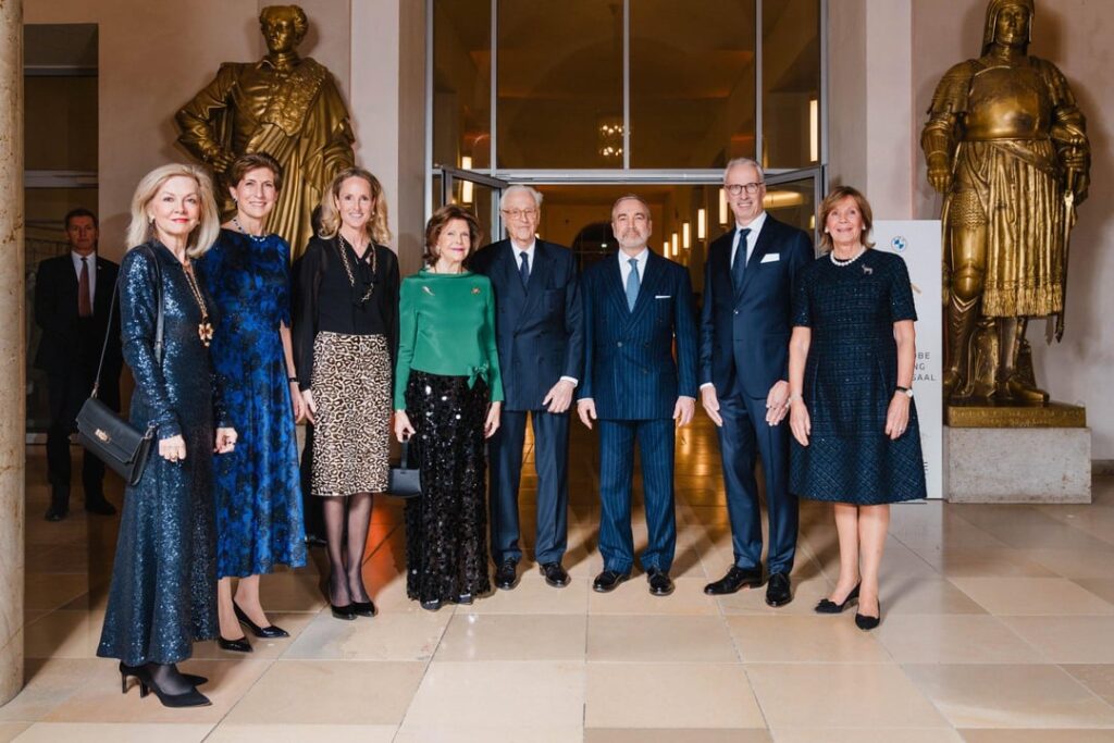 Queen Silvia of Sweden in trendy sequinned pants at the BMW Advent Benefit Concert in Munich last week