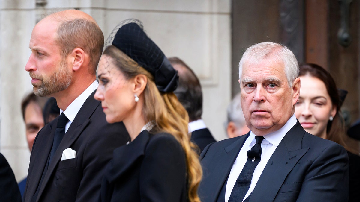 Ex-Prince Andrew looking directly at the camera as Prince William and Kate Middleton look away in public.