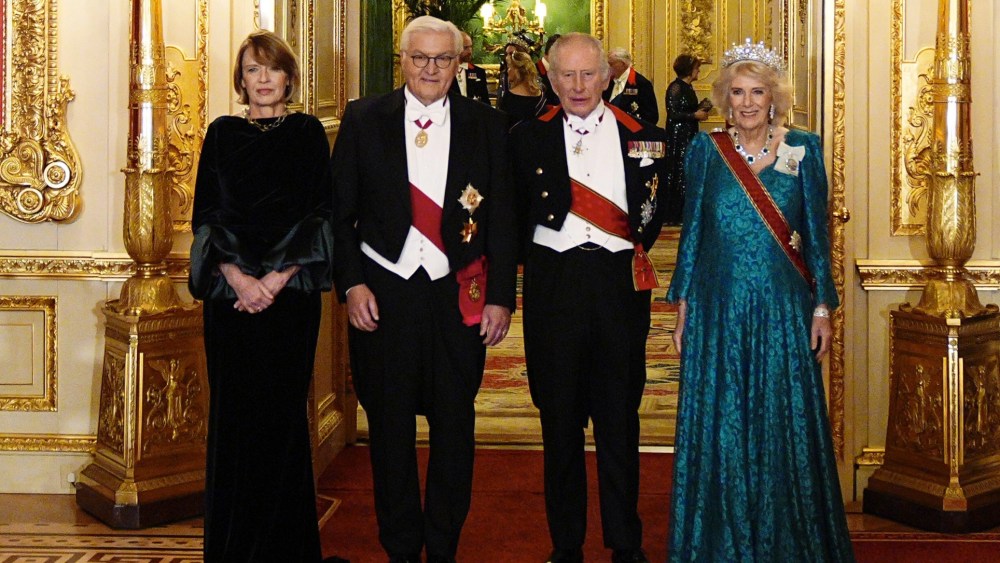 Queen Camilla wears a Fiona Clare dress with Queen Mary's Girls of Great Britain and Ireland Tiara and the Greville Emerald and Diamond Necklace for the state banquet for the German President at Windsor Castle on Dec. 3, 2025 in Windsor, England.