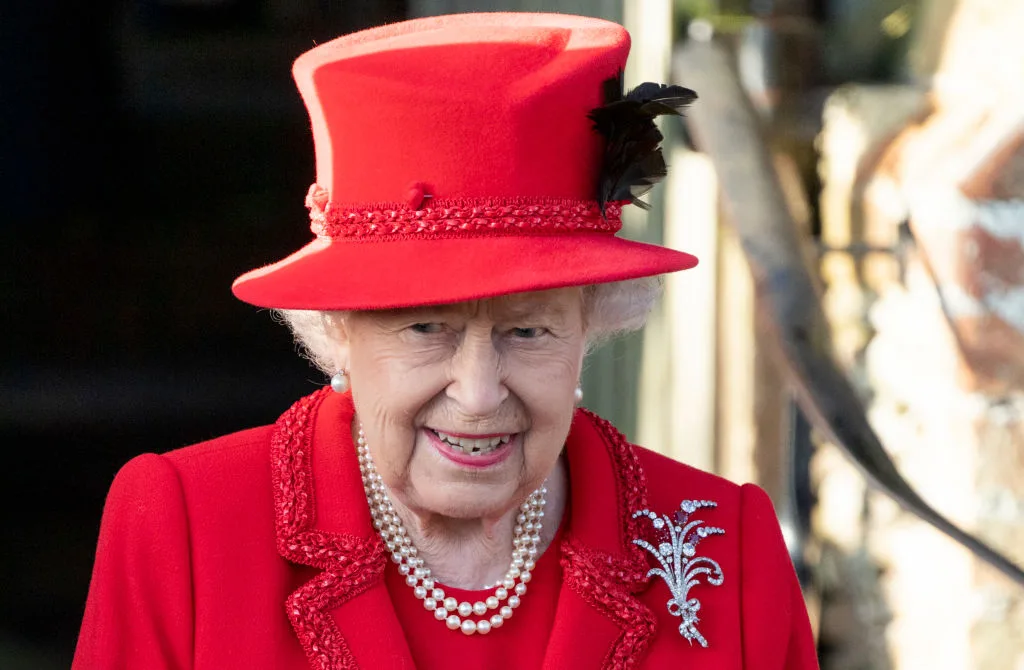 The Queen dressed in red