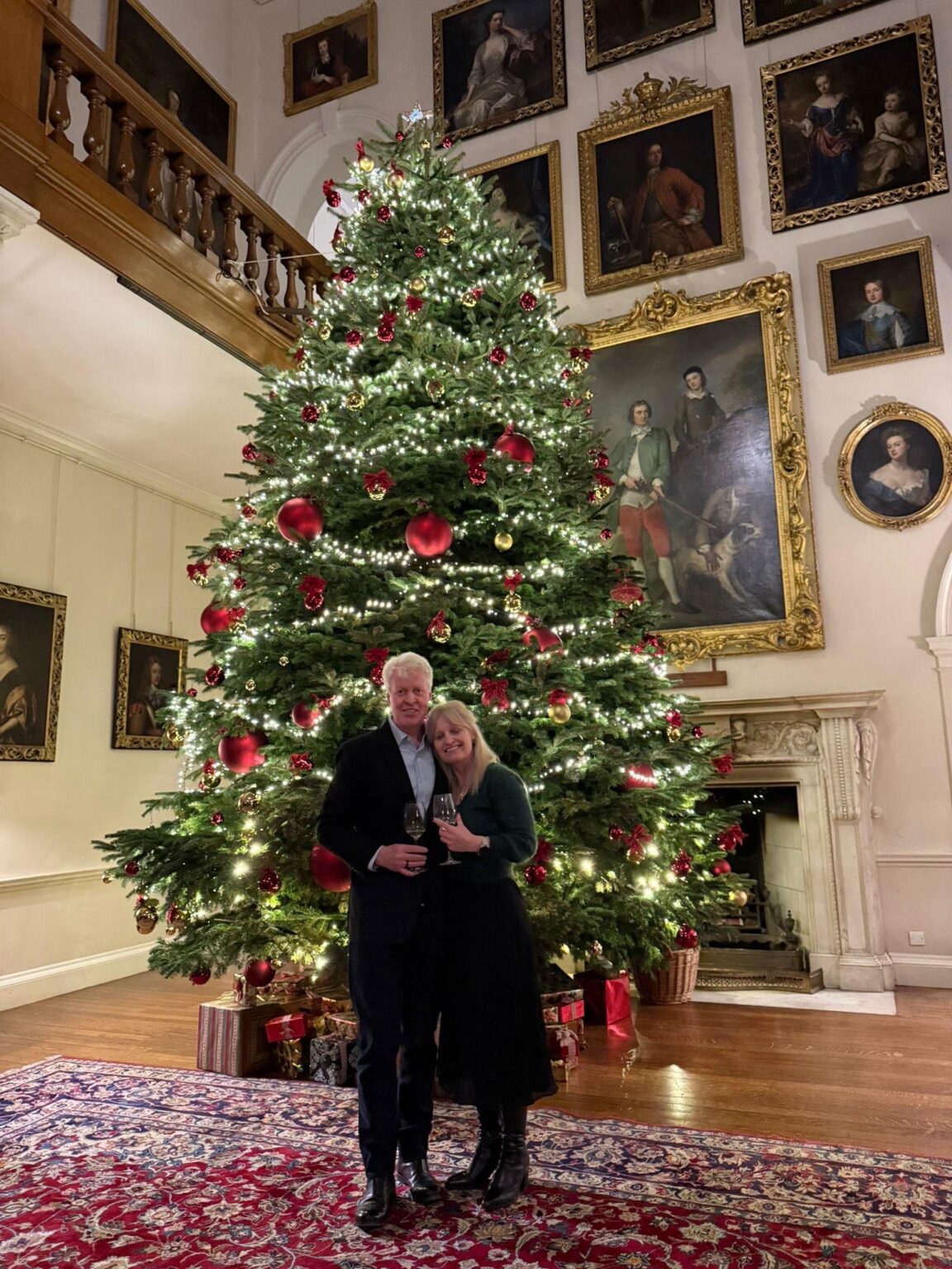 Charles Spencer shares photo with partner in front of their Christmas tree