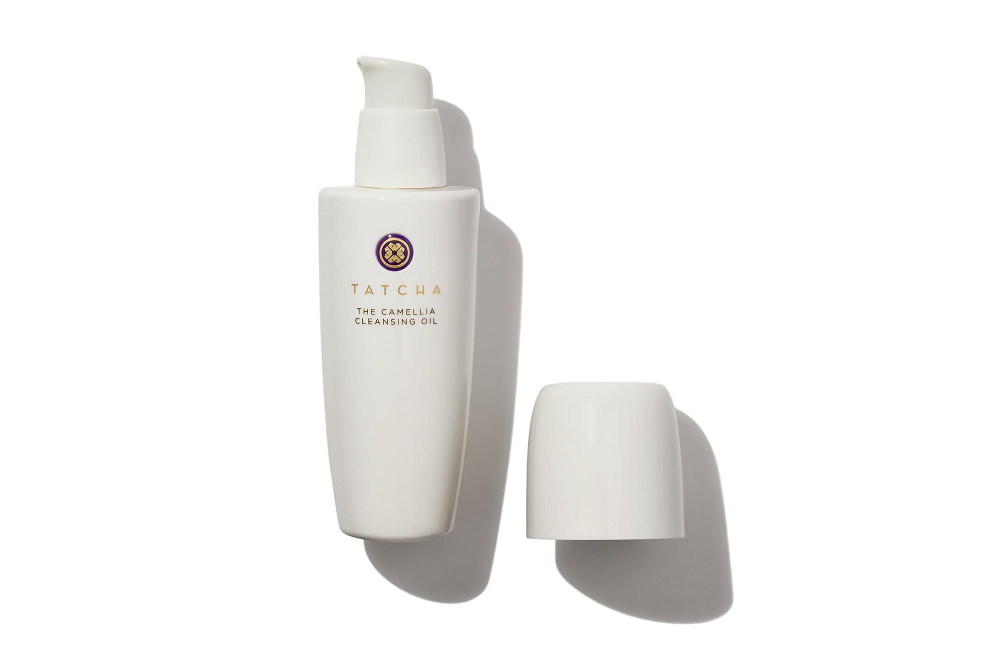 Tatcha The Camellia Cleansing Oil bottle with its cap off.