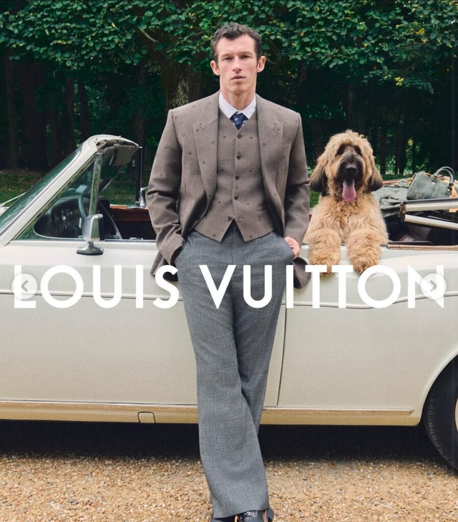 Louis Vuitton presents SS26 Pre-Collection by Pharrell, blending country escape vibes with LV’s signature and British gentleman influences. The campaign features Callum Turner and Jude Bellingham, accompanied by iconic British dog breeds from Welsh Corgi to English Cocker Spaniel