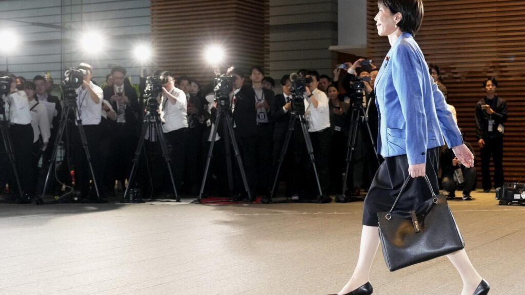 Japan's Takaichi wins fans with her fashion and 'work, work, work' mantra