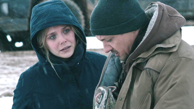 Elizabeth Olsen as Jane Banner looking at Jeremy Renner as Cory Lambert in Wind River