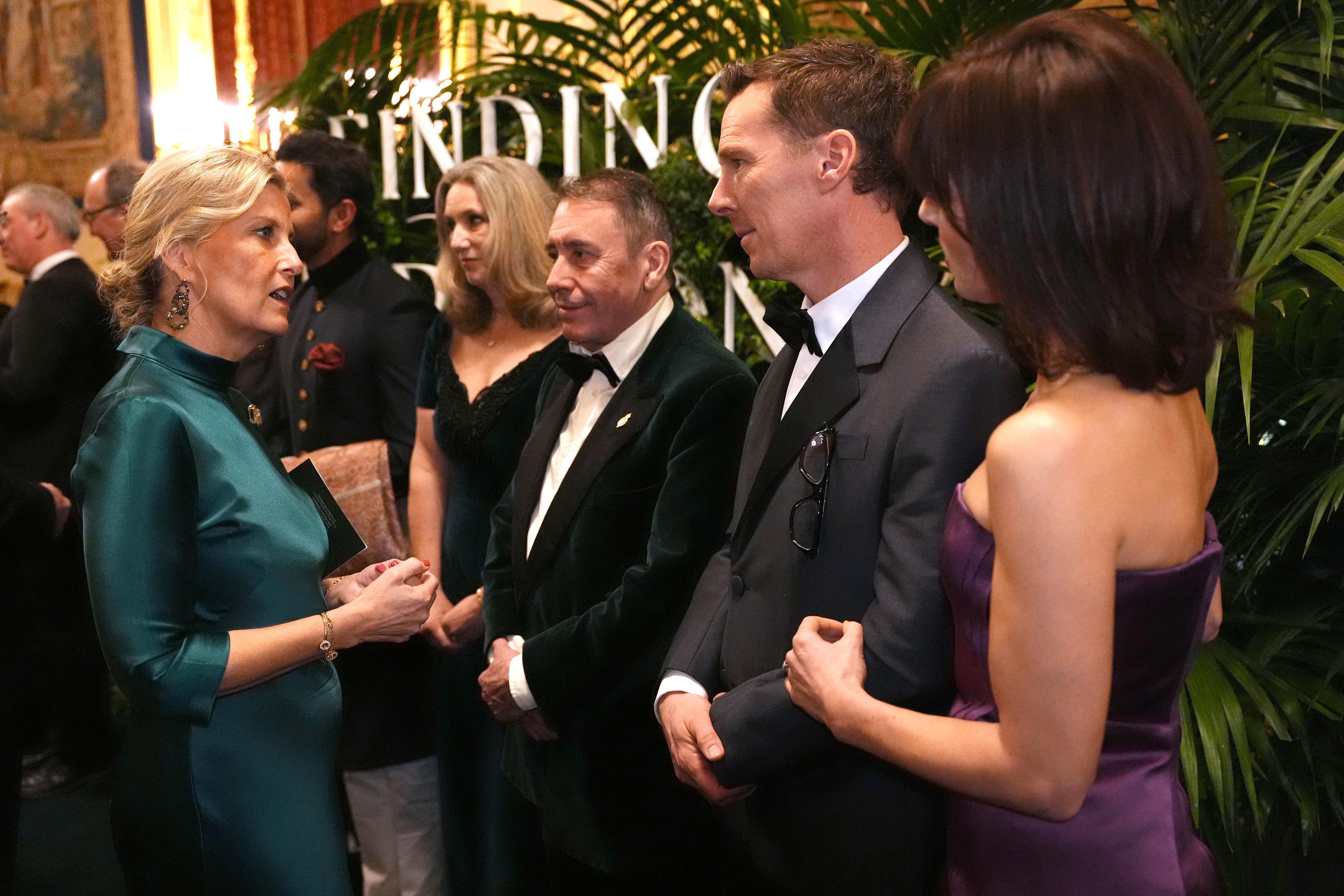 Sophie, Duchess of Edinburgh speaking to Jools Holland, Benedict Cumberbatch and Sophie Hunter at the premiere of "Finding Harmony: A King's Vision" at Windsor Castle.