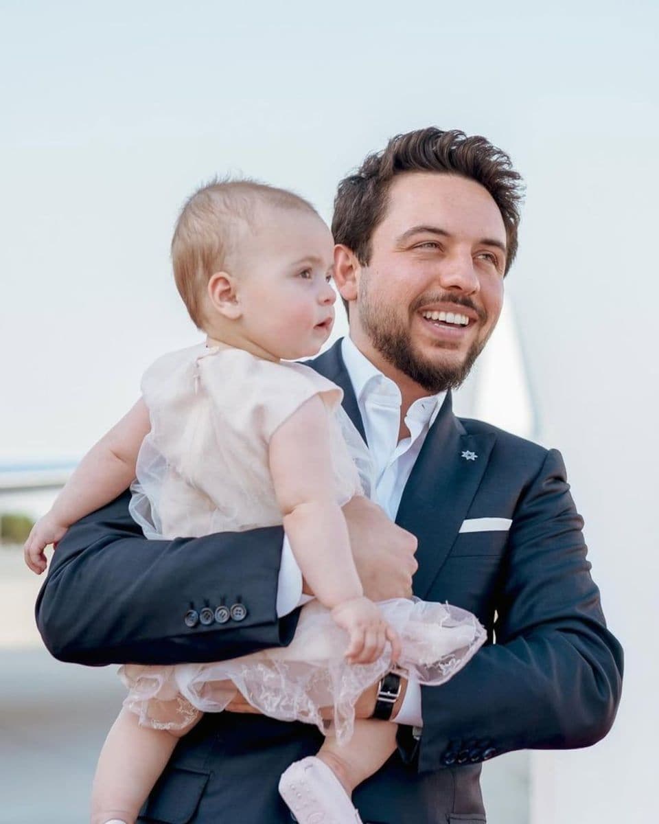 Crown Prince Hussein, Princess Rajwa, and Baby Iman in New Year family portrait.