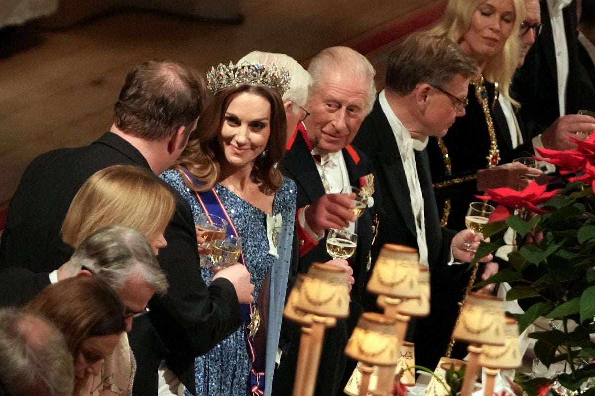 Britain's King Charles III, Germany's President Frank-Walter Steinmeier, and Britain's Catherine, Princess of Wales toast their glasses after the King delivered a speech during a State Banquet at Windsor Castle in Windsor.