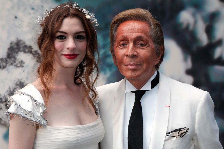 Anna Hathaway and Valentino at the White Fairy Tale Love Ball party at the Wideville castle near Paris in 2011. (AP Photo/Thibault Camus)