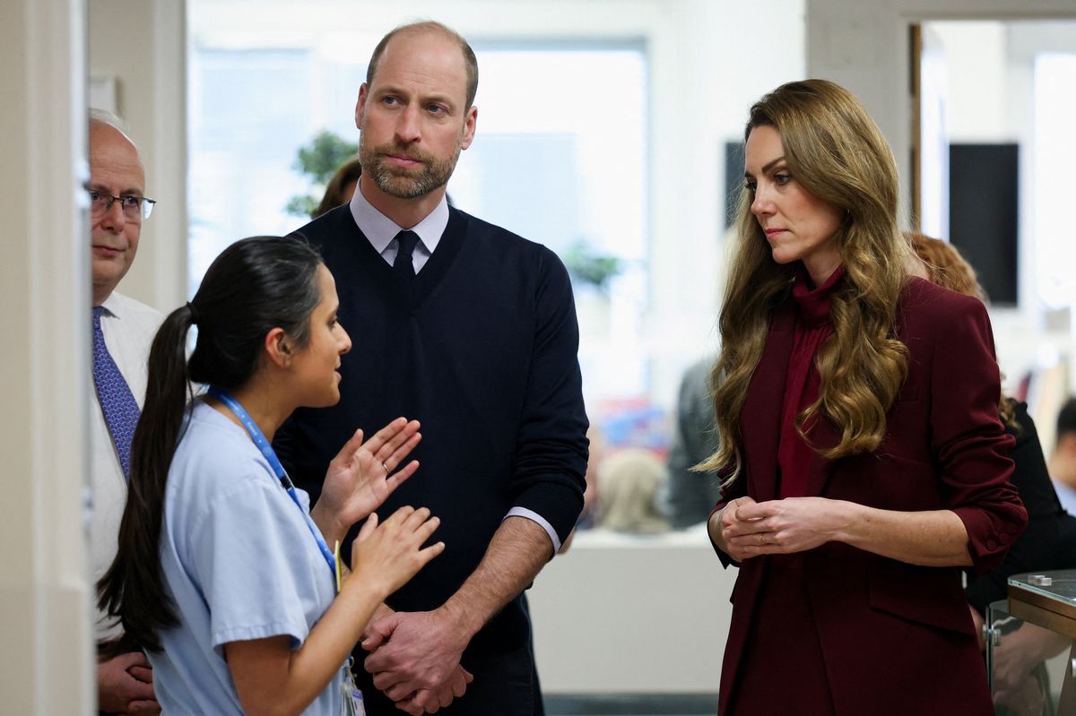 The Prince and Princess of Wales, joint Patrons of NHS Charities Together, speak with staff during a visit to Charing Cross Hospital