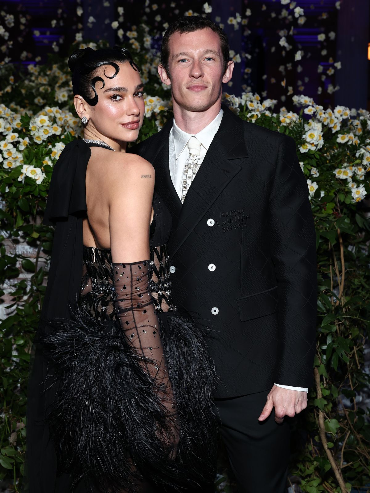 (L-R) Dua Lipa and Callum Turner attend the 2025 Met Gala Celebrating "Superfine: Tailoring Black Style" at Metropolitan Museum of Art on May 05, 2025 in New York City. 