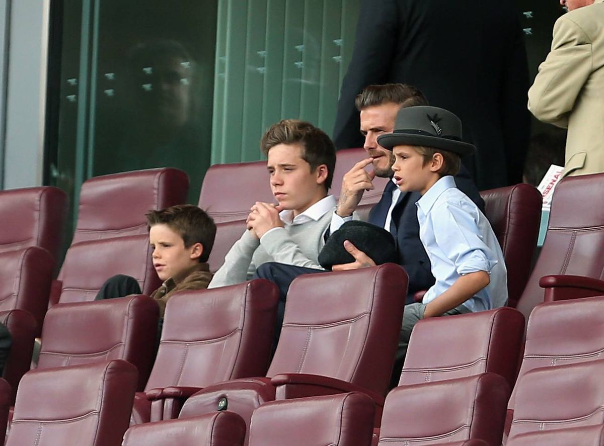 David Beckham with Brooklyn, Romeo and Cruz Beckham in 2010