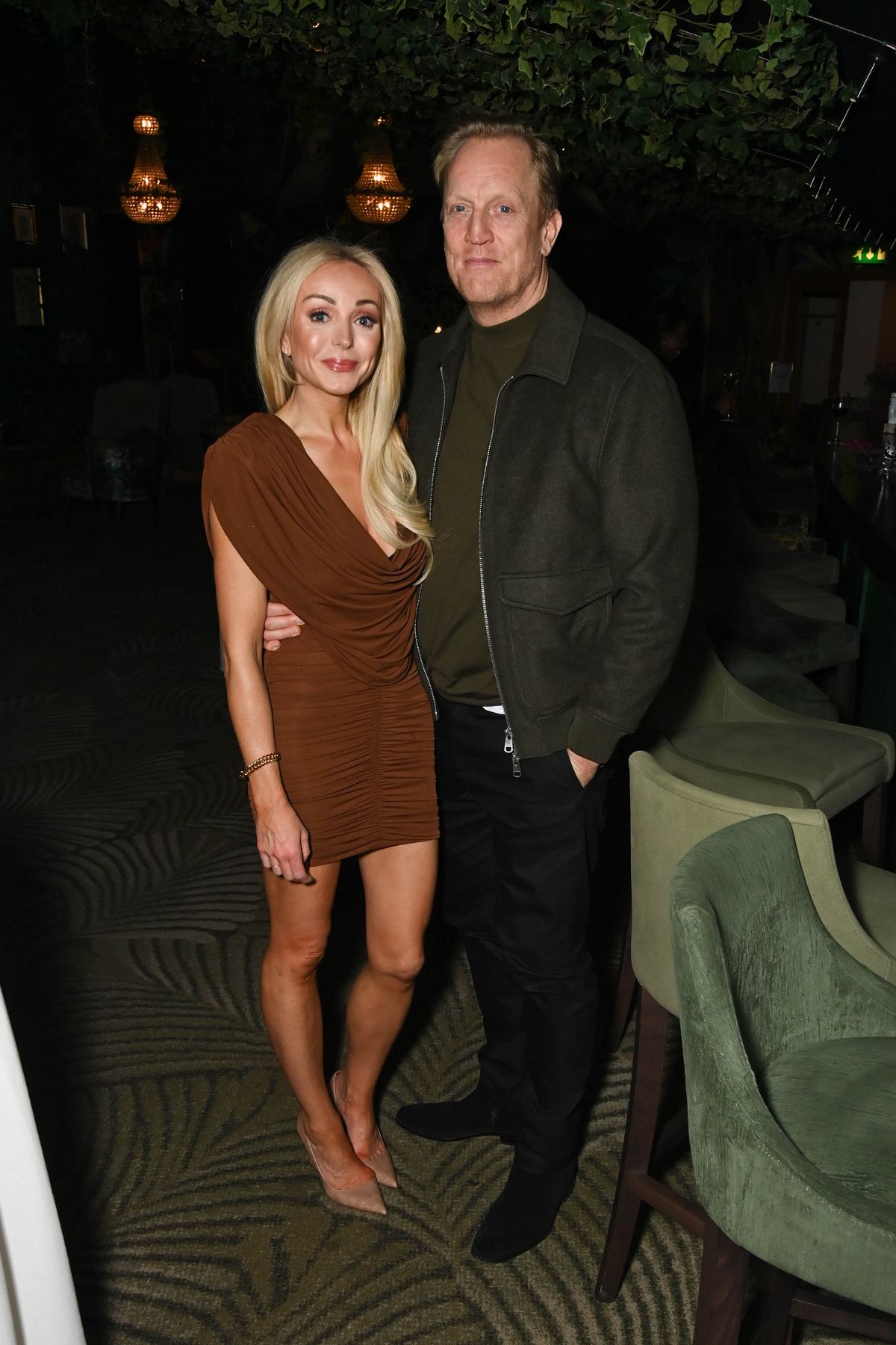 Helen George and Dan Innes in smart outfits to attend the Cirque du Soleil Premiere in London on 14 Jan 2026