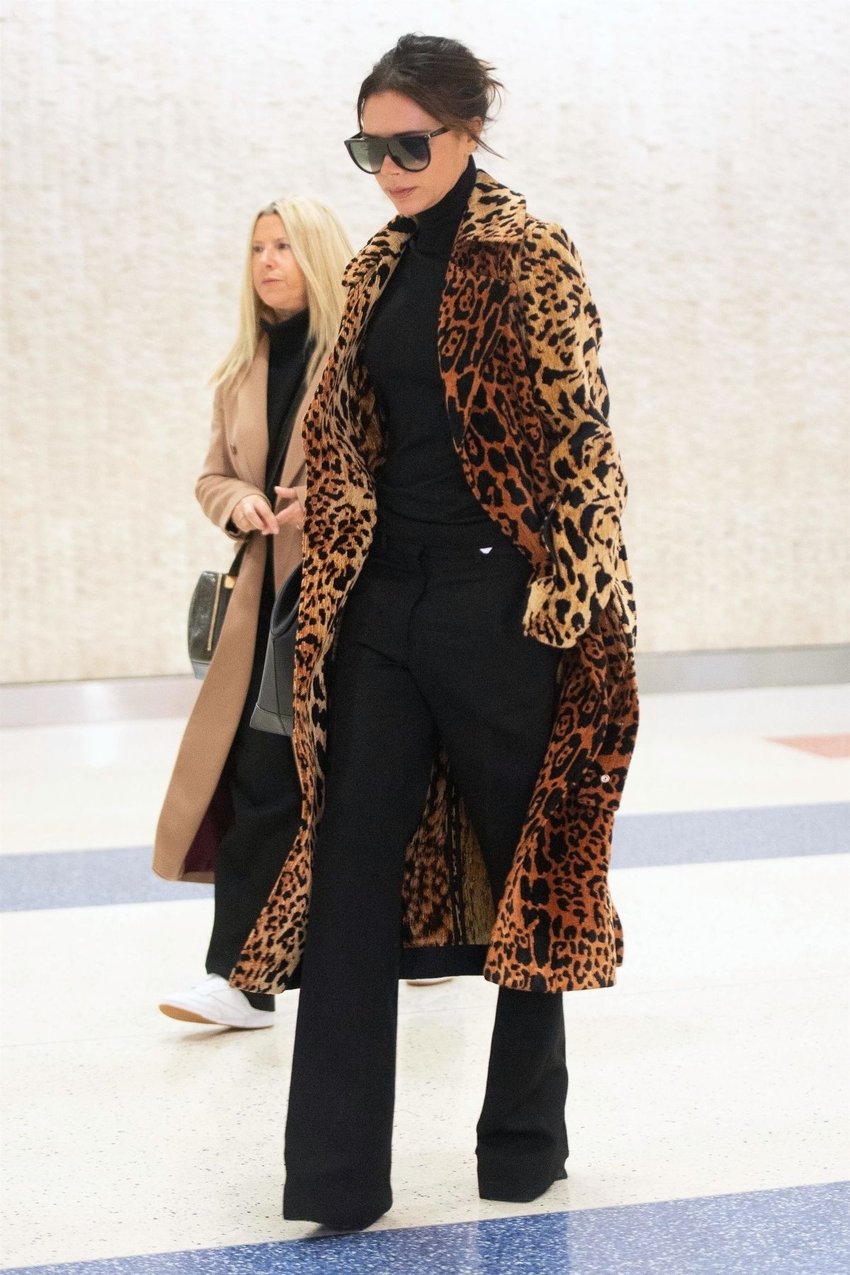 VB in leopard print jacket at jfk in new york