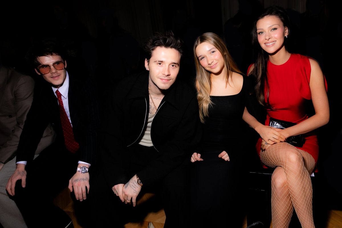 Brooklyn Beckham with Harper and wife Nicola 