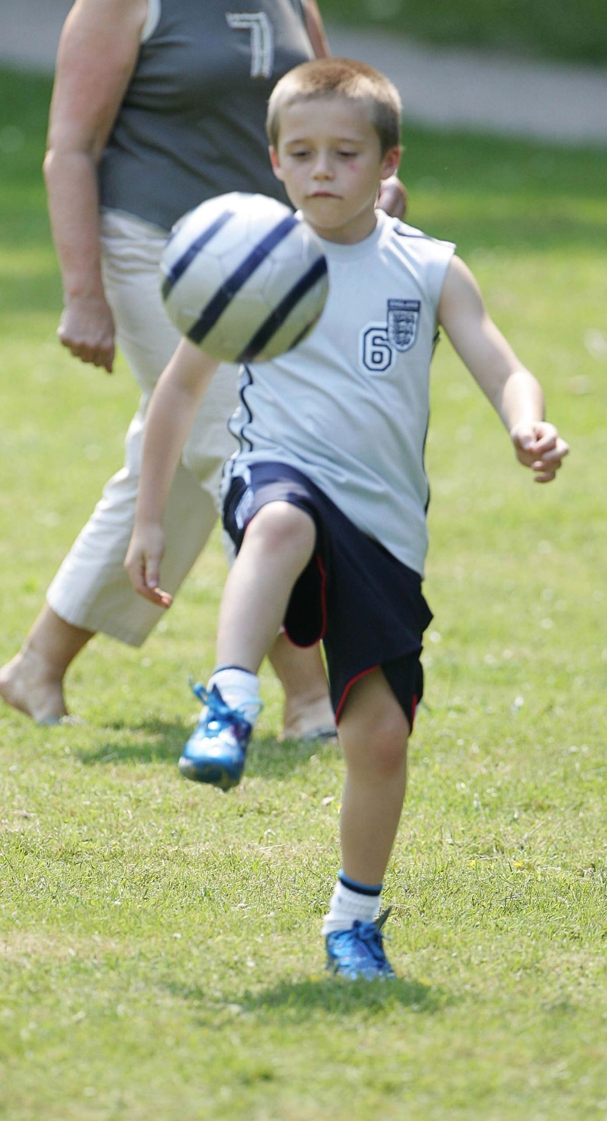 Brooklyn playing football as a youngster