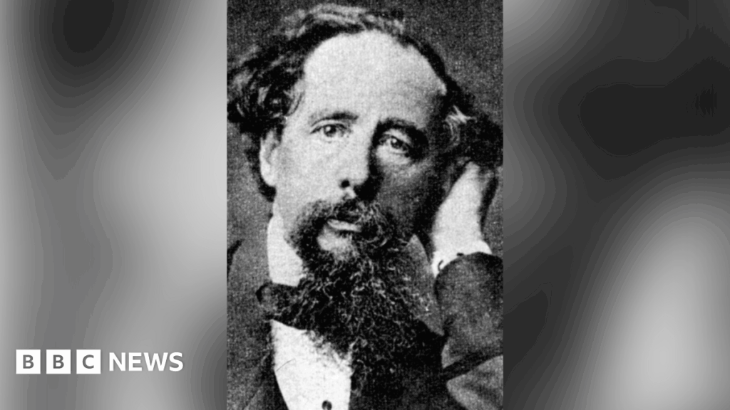 Worcester book shop to host Charles Dickens festival A black and white grainy photo of Charles Dickens. He has dark curly hair and a long, dark beard. He is wearing a dark jacket and white shirt.