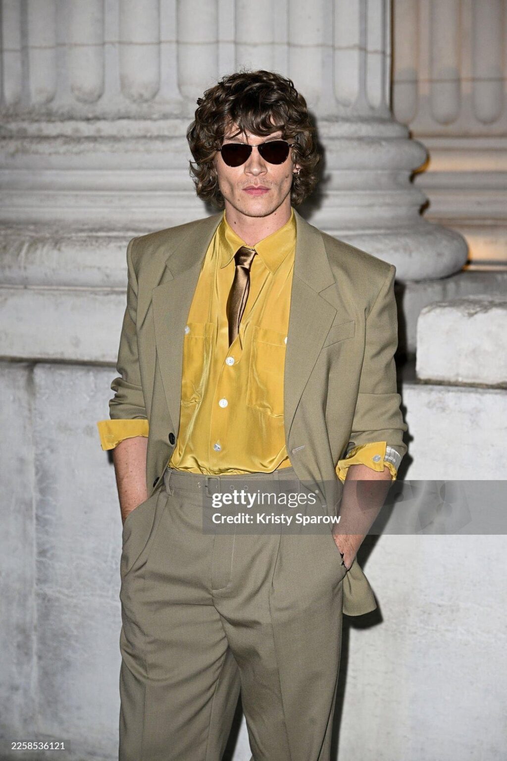 Connor Storrie, François Arnaud and Robbie G.K at the Saint Laurent show during Paris Fashion Week.