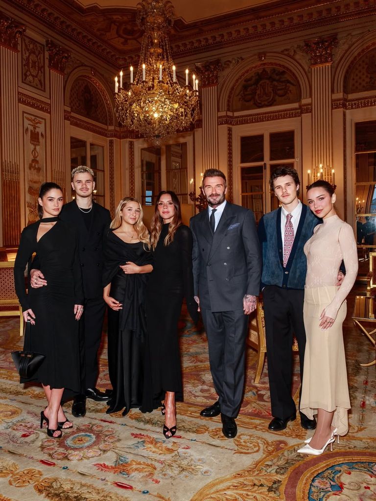 David and Victoria Beckham were given a show of support by their family at Paris Fashion Week on 26 January