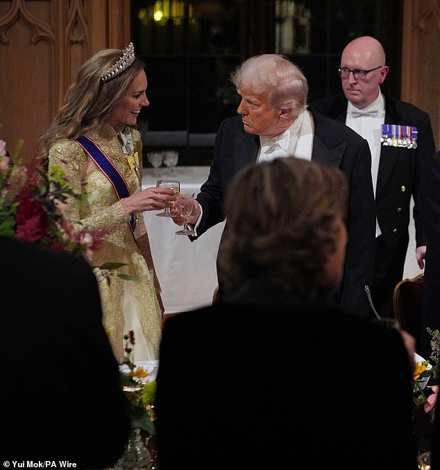 The Princess of Wales and the President clink glasses following a toast to their two nations at September's state visit