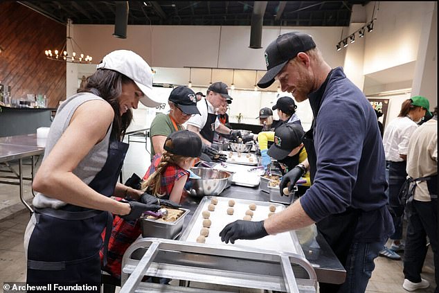 The restoration of Harry's round-the-clock armed police protection could encourage him to bring his children Archie, six, and Lilibet, four, (pictured volunteering with their parents during Thanksgiving last month) across the pond to spend some time with their grandfather, King Charles - who has reportedly not seen them since Queen Elizabeth II's Platinum Jubilee celebrations in June 2022