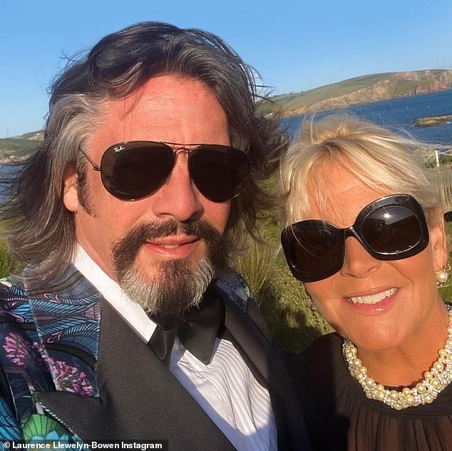 Laurence Llewelyn-Bowen has hit back at critics who think his unconventional living situation is 'strange' (pictured with his wife Jackie)