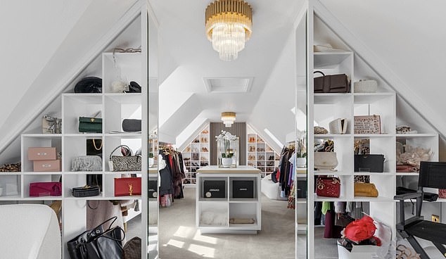 The Corrie star has been forced to reduce the price of her house by a third since putting it on the market in May (Helen's wardrobe pictured)