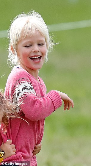 From their gorgeous light hair to their piercing blue eyes, similarities go back as far as childhood, with Isla (pictured aged six) and Zara sharing akin facial features and an adorable bright smile