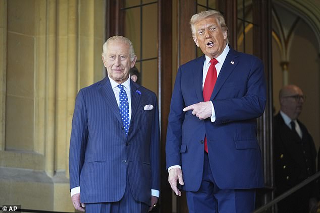 President Donald Trump gestures next to Britain's King Charles III before leaving Windsor Castle on September 18, 2025