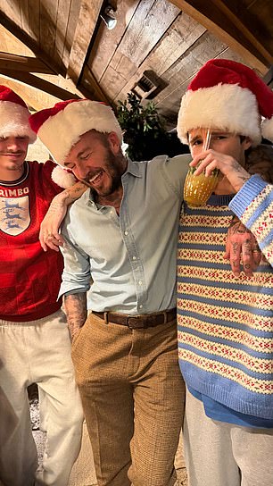 Victoria shared this image of David and their other two sons