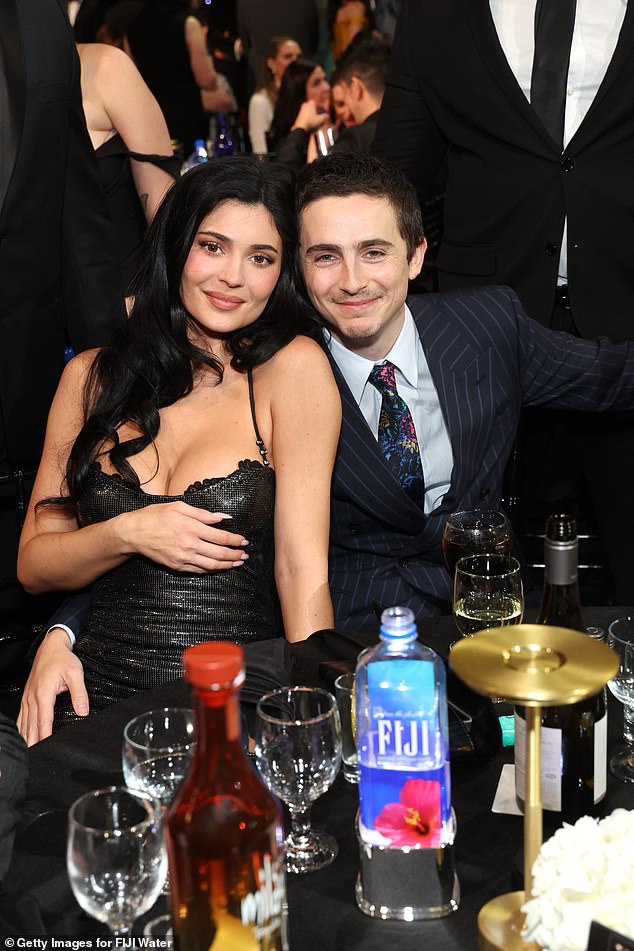 The two were pictured earlier at their table after arriving late