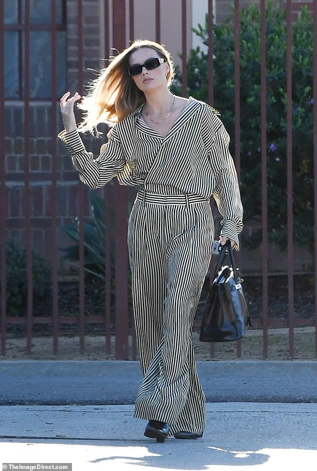 Margot, exuded an air of Hollywood glamour in a matching silk set from Austria-based fashion label Petar Petrov