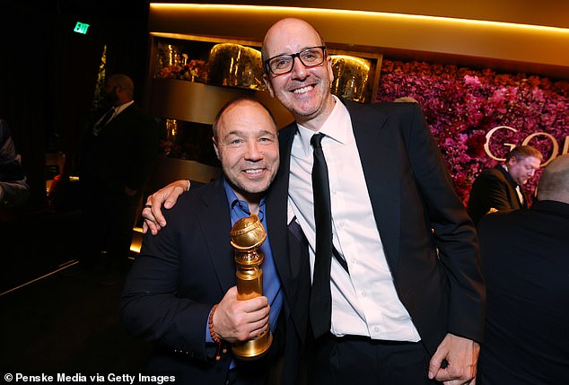 Stephen and Jack pictured after the prestigious ceremony ended