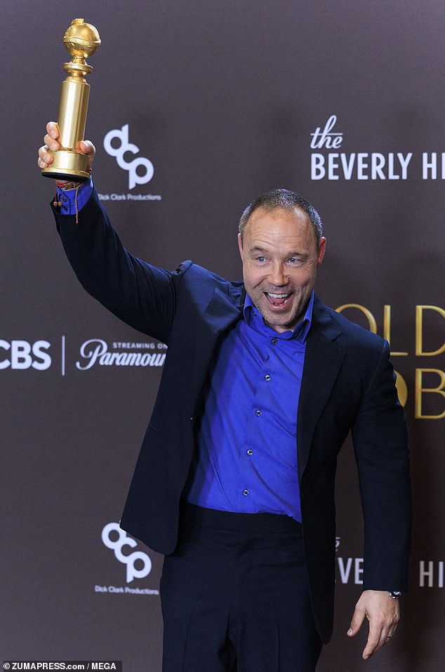 Stephen in the press room during the awards as he showed off his gong
