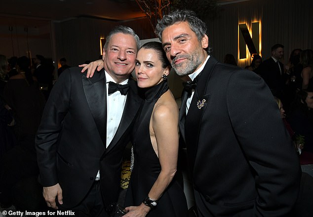 (L-R) Co-CEO of Netflix Ted Sarandos, Keri Russell and Oscar Isaac