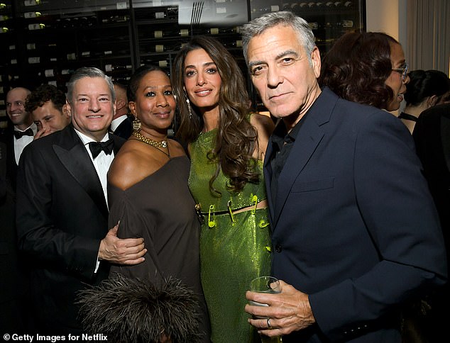 (L-R) Ted Sarandos, Netflix Co-CEO, Nicole Avant, Amal Clooney and George Clooney