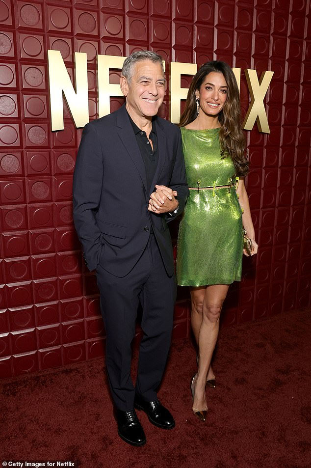Amal Clooney turned heads in a green minidress as she and George hit the Netflix Golden Globes after party