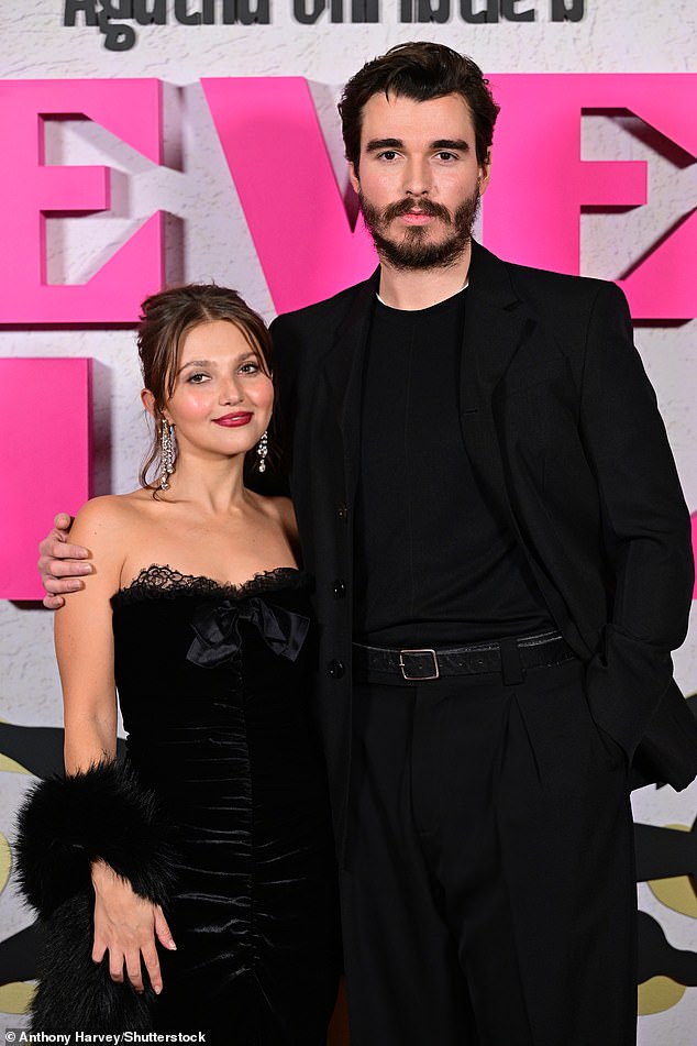 Corey opted for an all-black ensemble, featuring a tailored blazer with a t-shirt and high-waisted pants, as he sported a full beard