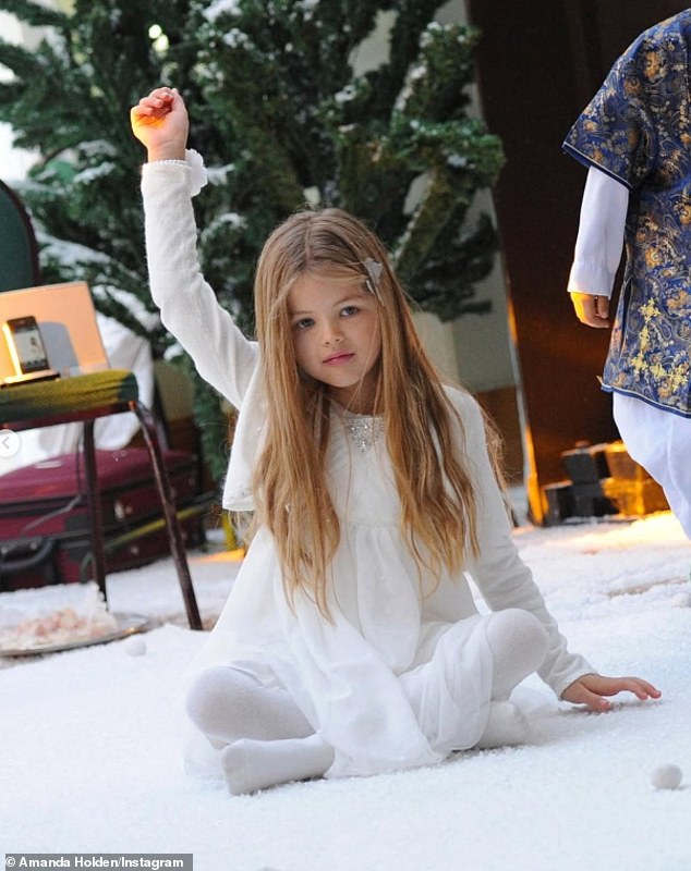 While Amanda also shared a sweet throwback photo of Lexi as a little girl, showing her raising her arm in the air in a near-identical pose