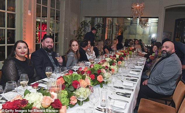 There were red, pink and white roses down the center of the table