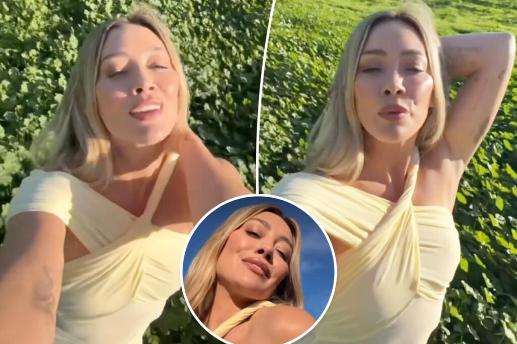 Hilary Duff teases new song wearing semi-sheer minidress amid mom group drama