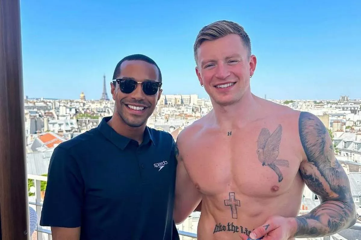 Michael Gunning with Adam Peaty at the Paris Olympics last year