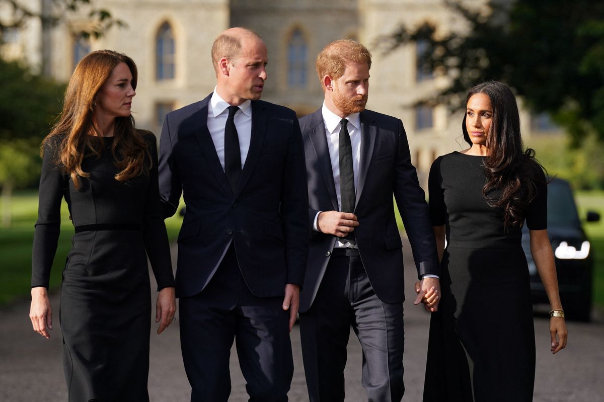 Britain's Catherine, Princess of Wales, Britain's Prince William, Prince of Wales, Britain's Prince Harry, Duke of Sussex, and Meghan, Duchess of Sussex on the long Walk at Windsor Castle on September 10, 2022, before meeting well-wishers. 