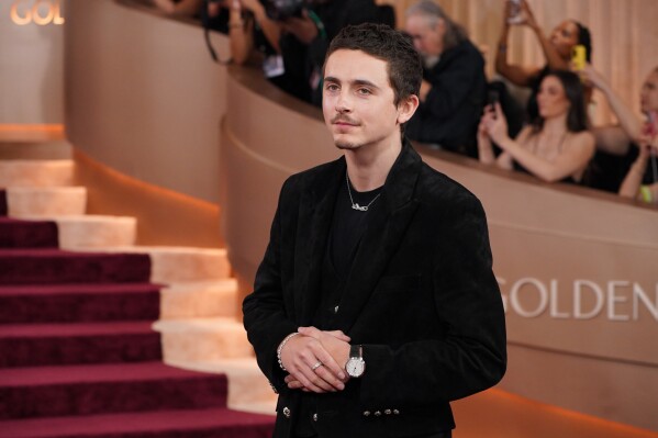 Timothee Chalamet arrives at the 83rd Golden Globes on Sunday, Jan. 11, 2026, at the Beverly Hilton in Beverly Hills, Calif. (Photo by Jordan Strauss/Invision/AP)