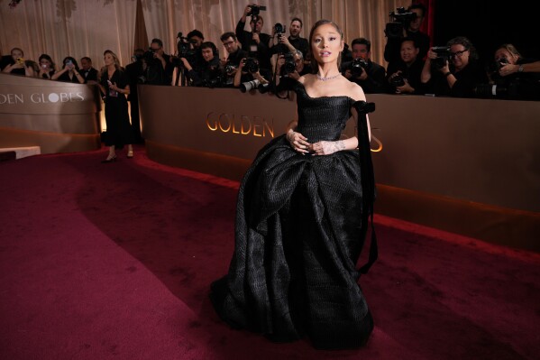 Ariana Grande arrives at the 83rd Golden Globes on Sunday, Jan. 11, 2026, at the Beverly Hilton in Beverly Hills, Calif. (Photo by Jordan Strauss/Invision/AP)